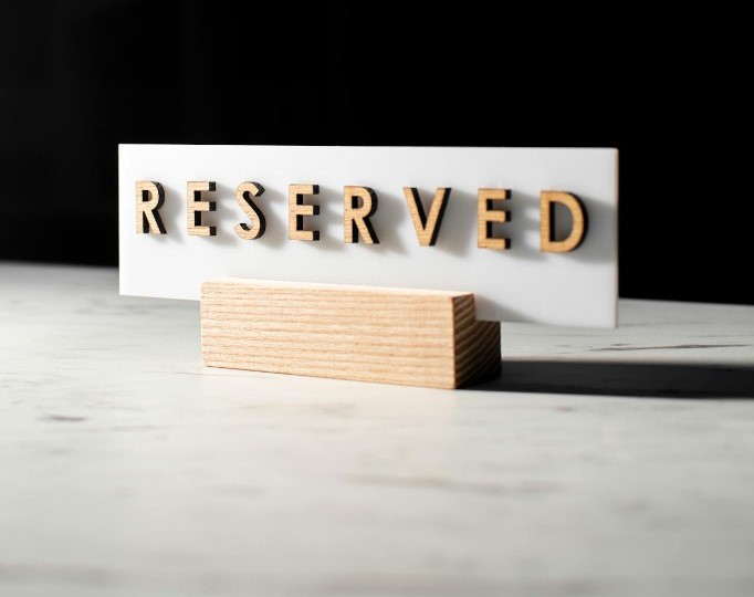Reserved sign on a table